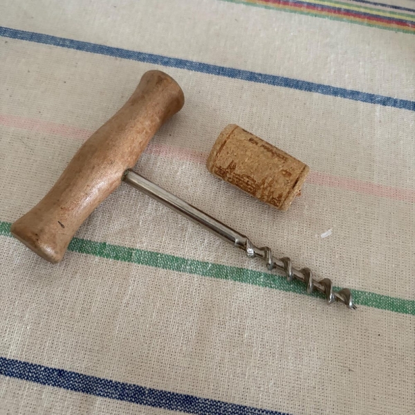 An original  rustic French farm house vintage light brown varnished wooden handled Corkscrew